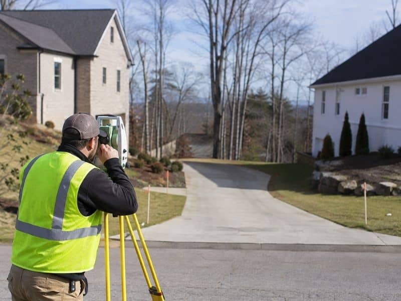 ALTA Title Survey checking driveway and property access in Vestavia Hills Alabama